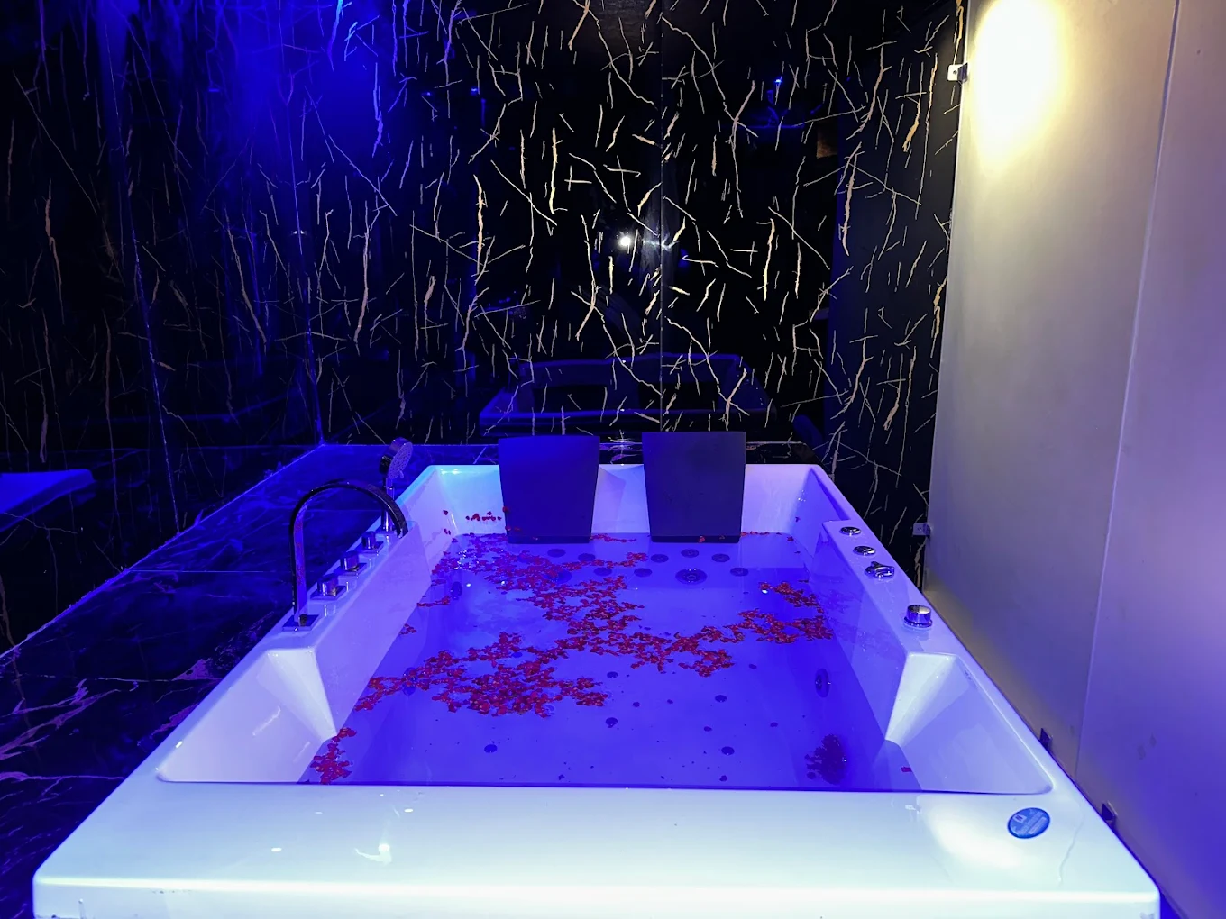 Romantic jacuzzi with rose petals